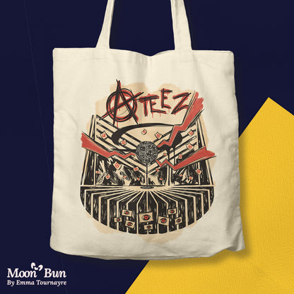 Picture of the ATEEZ Guerilla totebag on a gold and blue background